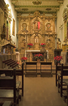 MISSION SAN JUAN CAPISTRANO CHAPEL GOLD ALTER AND CANDLES
