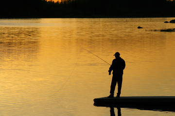 Fishing at the sunset