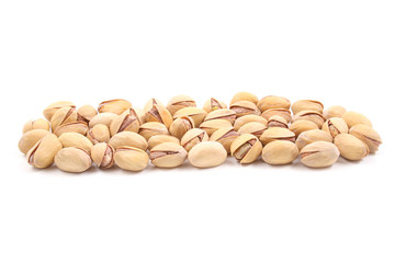 row of pistachio isolated on white