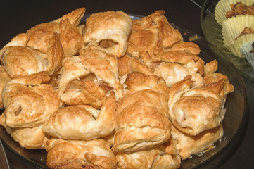 A delicious assortment of flakey apple tarts.
