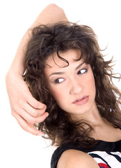 Fototapeta premium Beautiful brunette make a hair with hand