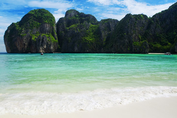 Famous beach in Thailand with green hills