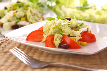Fresh tomato salad with corn and basil