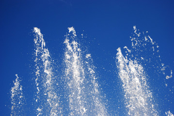 Water drops over blue sky.