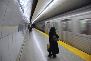 Passengers waiting on subway platform