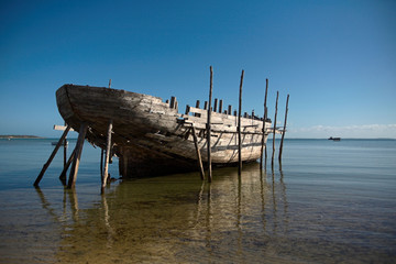 rear view of a big dhow or traditional wooden boat 