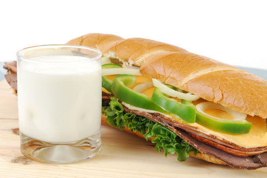 A Glass Of Cold Milk And A Giant Submarine Sandwich