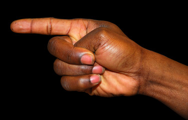 Finger pointig the way isolated on black background