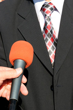 TV reporter with microphone, Tv interview