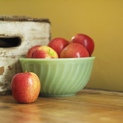 studio shot of apples in bowl