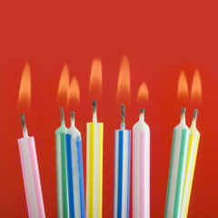 studio shot close up of lite birthday candles