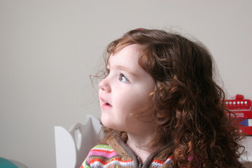 Smiling girl with curls