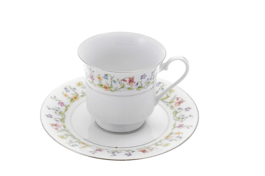 Empty china teacup on a white background.