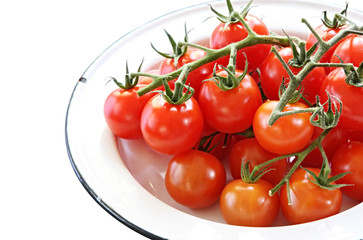 Enamel bowl of cherry tomatoes. 