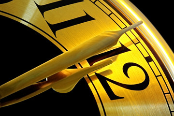 Clock showing two minutes to midnight.  