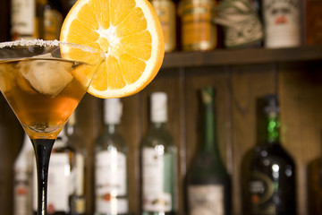 Cocktail made with lemon on a bar