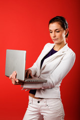 A young business woman using a laptop