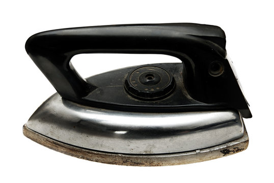 Photo of the vintage iron on the white background