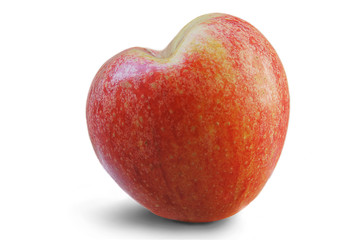 red heart shaped apple isolated over white