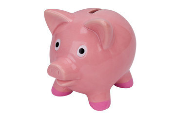 Pink piggy bank isolated over white