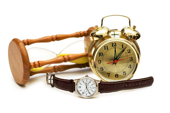 Time concept with watch, clock and hour glass