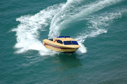 Motor Boat Making A Turn In The Sea