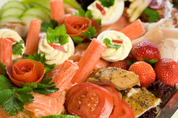 Delicious salad with fish and chicken