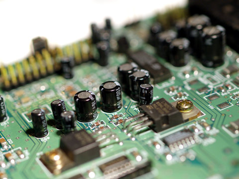 Close up of circuit board showing various electronic components
