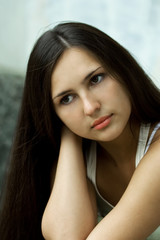 Naklejka premium Sad meditations of the beautiful girl.