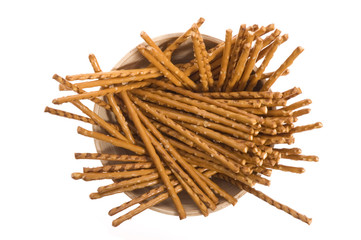 bowl of snacks isolated on the white backgound. sticks