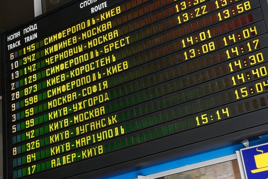 Schedule board of a railway station with cyrillic letters