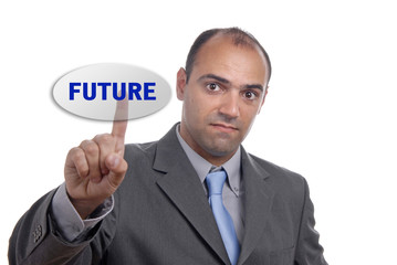 Businessman in a suit presses the future key