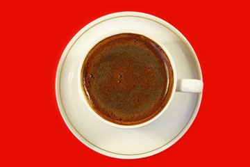 black coffee in the white cup. red backgrounds