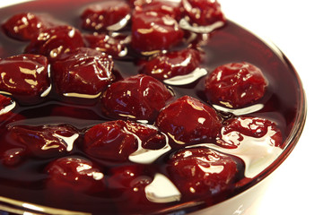 sweet cherries jam  in the transparent glass