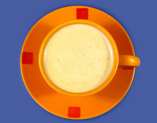 black coffee in the orange cup. blue backgrounds