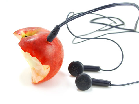 Half Bitten Apple With Earphones Like Mp3 Player. Isolated..