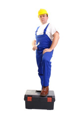Serviceman with flat wrench and toolbox