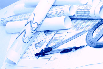 Business accessories on a background of diagrams