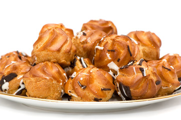 pastry filled with custard on white background.