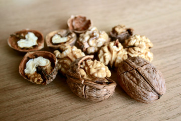 cracked nuts on wooden table