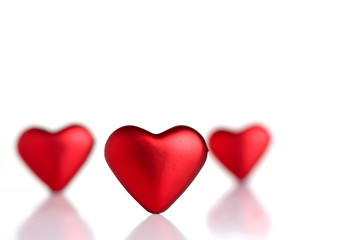 Red valentine hearts isolated on white