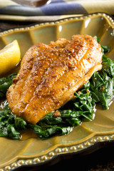 Spiced catfish fillet with spinach