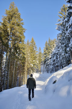 Man Walking In The Snow