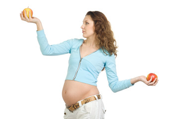 Pregnant women with apples. Isolate on white.