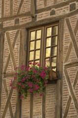 Fototapeta na wymiar windows of half-timbered house, Ambois, France