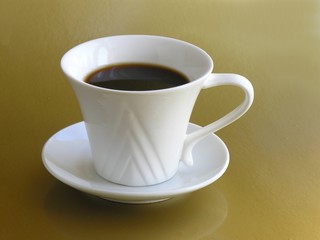 cup of black coffee on gold bacground