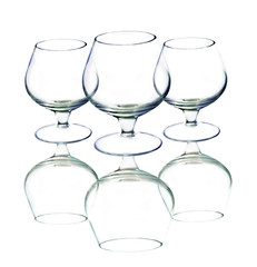 Empty wine glasses on white background