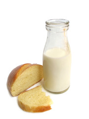 Old fashioned milk bottle with bread