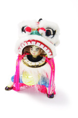 Miniature Lion Dancing Ornament on White Background