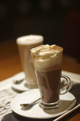Mint HOT CHOCOLATE with cream  in a glass 